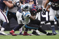Houston Texans quarterback Deshaun Watson (4) is sacked by Carolina Panthers outside linebacker Shaq Thompson (54) during the first half of an NFL football game Sunday, Sept. 29, 2019, in Houston. (AP Photo/Eric Christian Smith)
