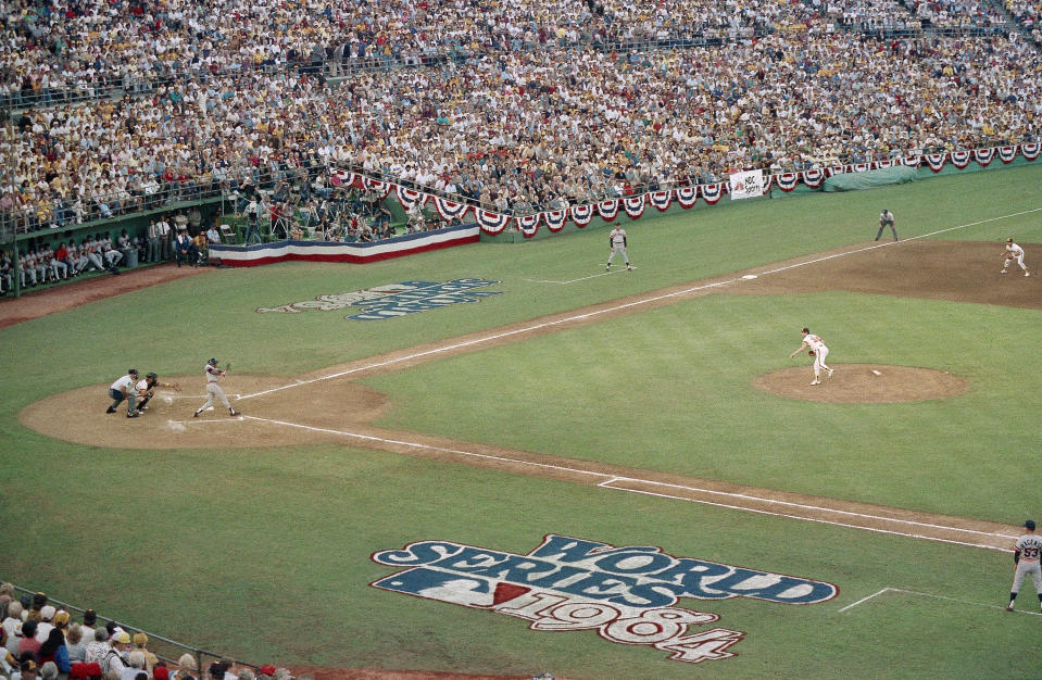 FILE - In this Oct. 9, 1984, file photo, San Diego Padres pitcher Mark Thurmond throws a pitch toward a Detroit Tigers batter in the first inning of the opening game of the World Series at Jack Murphy Stadium in San Diego. The biggest piece of San Diego's sports history is slowly being knocked down and ground to bits. Now the stadium is coming to an unceremonious end, leaving generations of fans feeling melancholy because, due to the coronavirus pandemic, they didn't get to say a proper goodbye to the place where they tailgated with gusto in the massive parking lot before cheering on the Chargers, Padres and Aztecs, or watched myriad other events and concerts. (AP Photo/File)