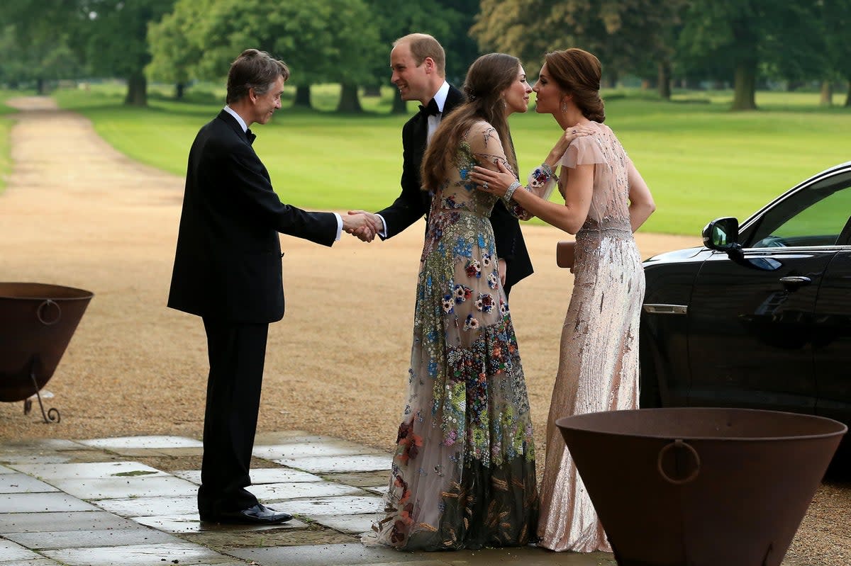 Prince William and Kate Middleton are greeted by David Cholmondeley, Marquess of Cholmondeley and Rose Cholmondeley, the Marchioness of Cholmondeley as they attend a gala dinner in support of East Anglia’s Children’s Hospices’ nook appeal at Houghton Hall on June 22, 2016 (Getty Images)