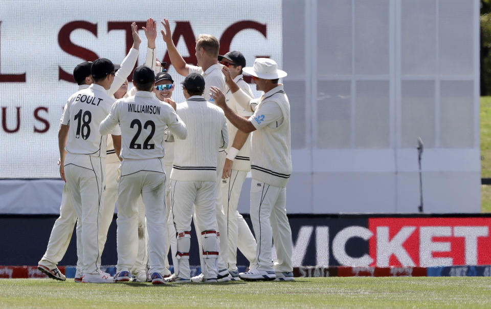 New Zealand players celebrate the dismissal of India's Prithvi Shaw during play on day one of the second cricket test between New Zealand and India at Hagley Oval in Christchurch, New Zealand, Saturday, Feb. 29, 2020. (AP Photo/Mark Baker)