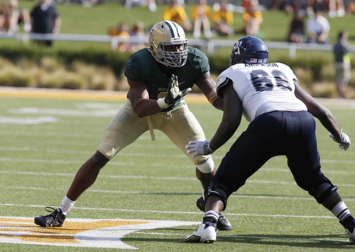 Calvin Anderson was a three-year starter at left tackle for Rice. He will finish his college career at Texas. (Getty Images)