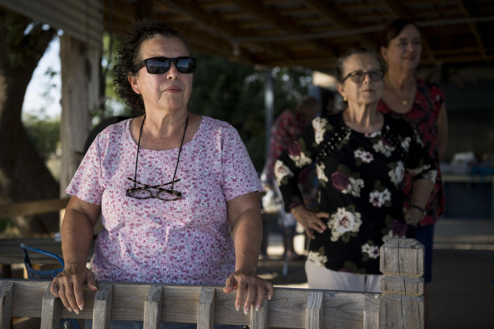 MISSION, TX - AUGUST 22: Norma Anzaldua stands with her family watching the Rio Grande river on her family's land on August 22, 2018 in Mission, Texas.  (Photo by Carolyn Van Houten/The Washington Post via Getty Images)