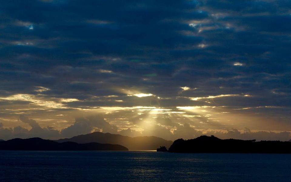 Morning breaks over New Zealand's Bay of Islands. | Jillian Dara