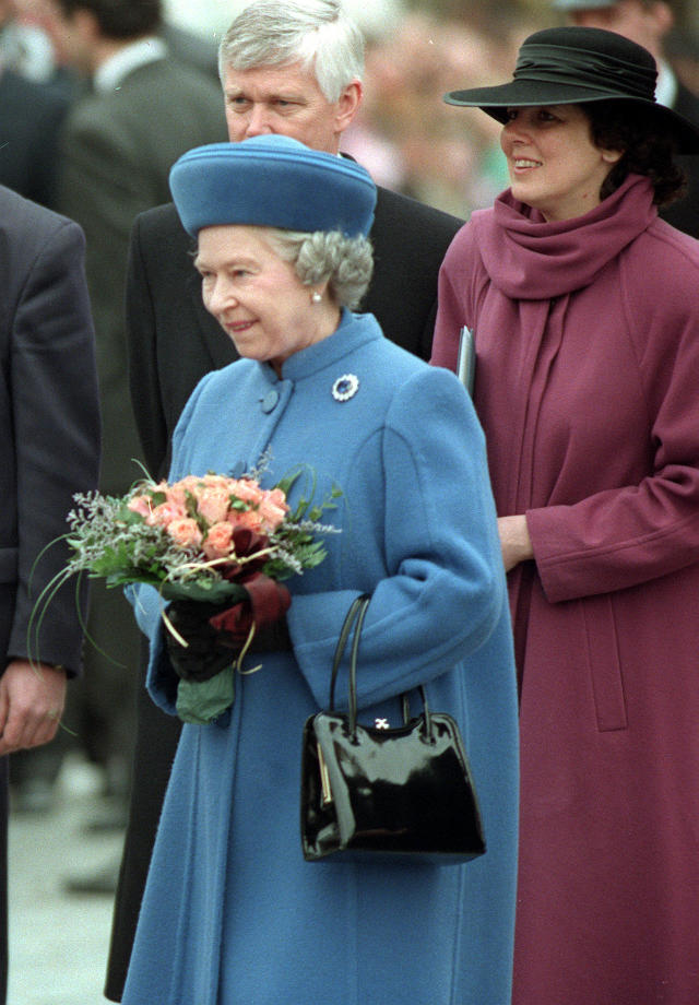 Queen Elizabeth dazzles in rose brooches worth £80k whilst