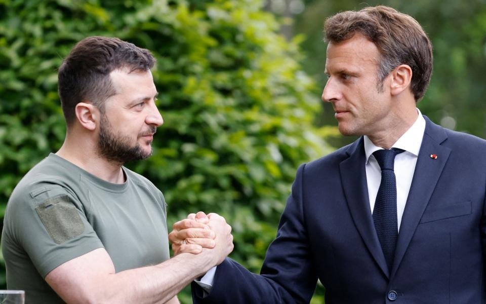 Volodymyr Zelensky and Emmanuel Macron - POOL/AFP via Getty Images