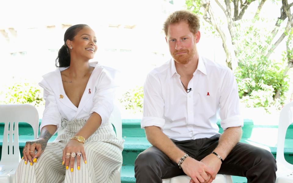 Prince Harry with pop star Rihanna in Barbados in 2016 - Getty