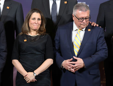 Canada's Minister of Foreign Affairs Chrystia Freeland and Canada's Minister of Public Safety Ralph Goodale wait for a group photo to be taken on the second day of Foreign ministers meetings from G7 countries in Toronto, Ontario, Canada April 23, 2018. REUTERS/Fred Thornhill