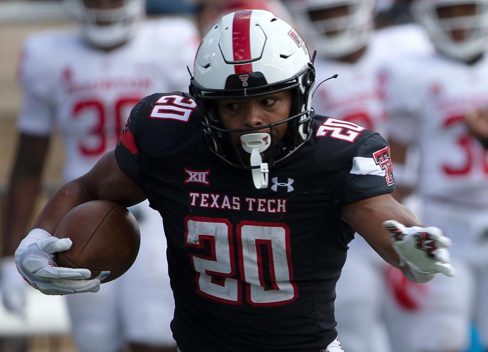 Texas Tech's wide receiver Nehemiah Martinez prepares to score a touchdown against Houston in a football game, Saturday, Sept. 10, 2022, at Jones AT&T Stadium.