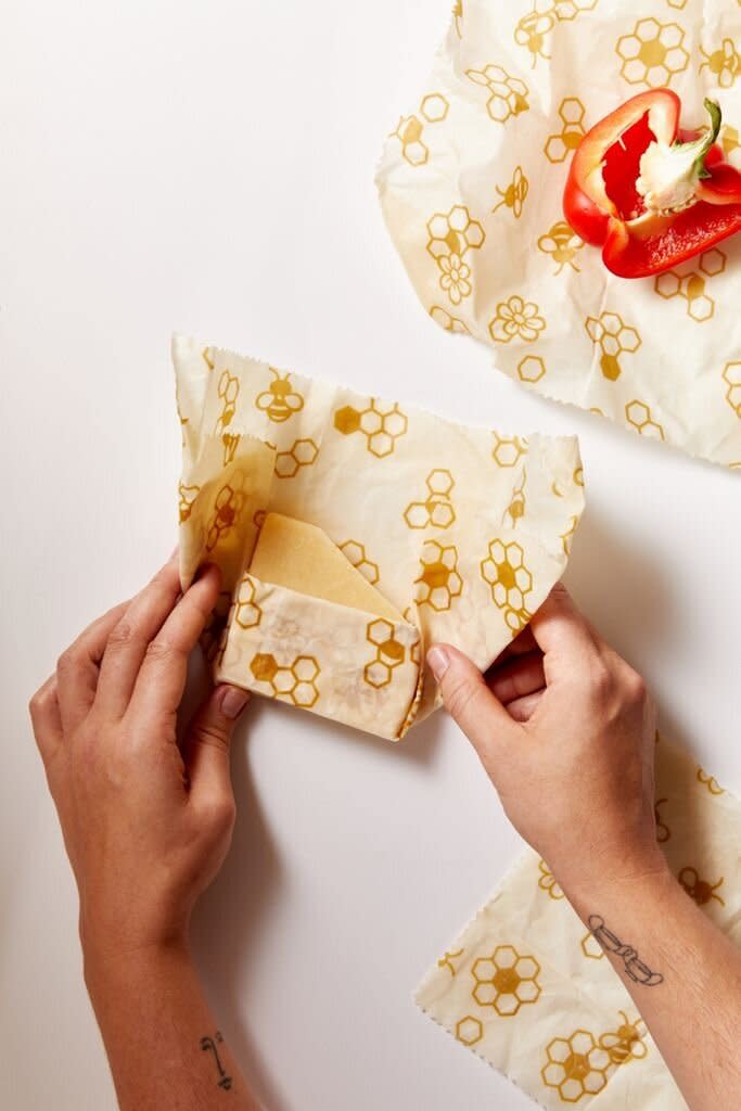 Made with cotton and beeswax, this wrap can be used to store avocado halves, lemons, herbs and more. You can hand wash the wrap in cold water and compost it once you've finished with it. <a href="https://fave.co/34vACcr" target="_blank" rel="noopener noreferrer">Find a set of three for $16 at Urban Outfitters</a>.&nbsp;