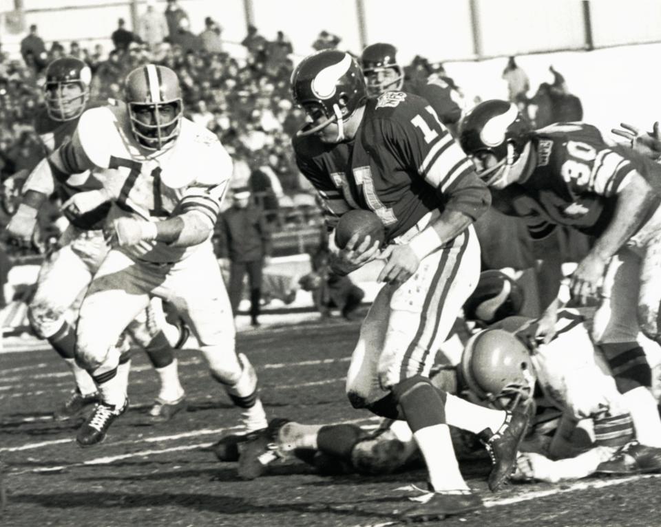 Browns defensive tackle Walter Johnson (71) pursues Vikings quarterback Joe Kapp (11) during the 1969 NFL Championship game at Metropolitan Stadium, Jan. 4, 1970, in Bloomington, Minnesota. The Vikings won 27-7.