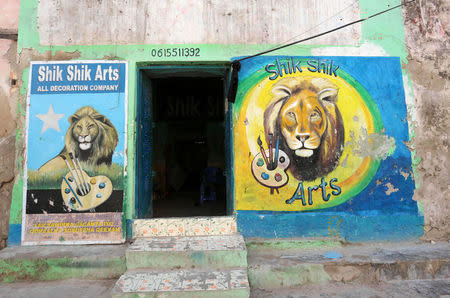 A mural shows lions on a wall of the Shik Shik art shop in Hamarweyne district of Mogadishu, Somalia, June 8, 2017. REUTERS/Feisal Omar