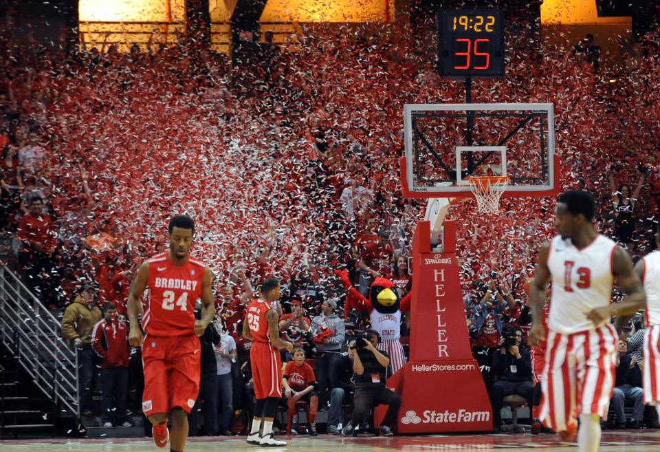 In this 2014 file photo, confetti fills the air over one section of Redbird Arena as Illinois State scores its first points against Bradley in Normal.