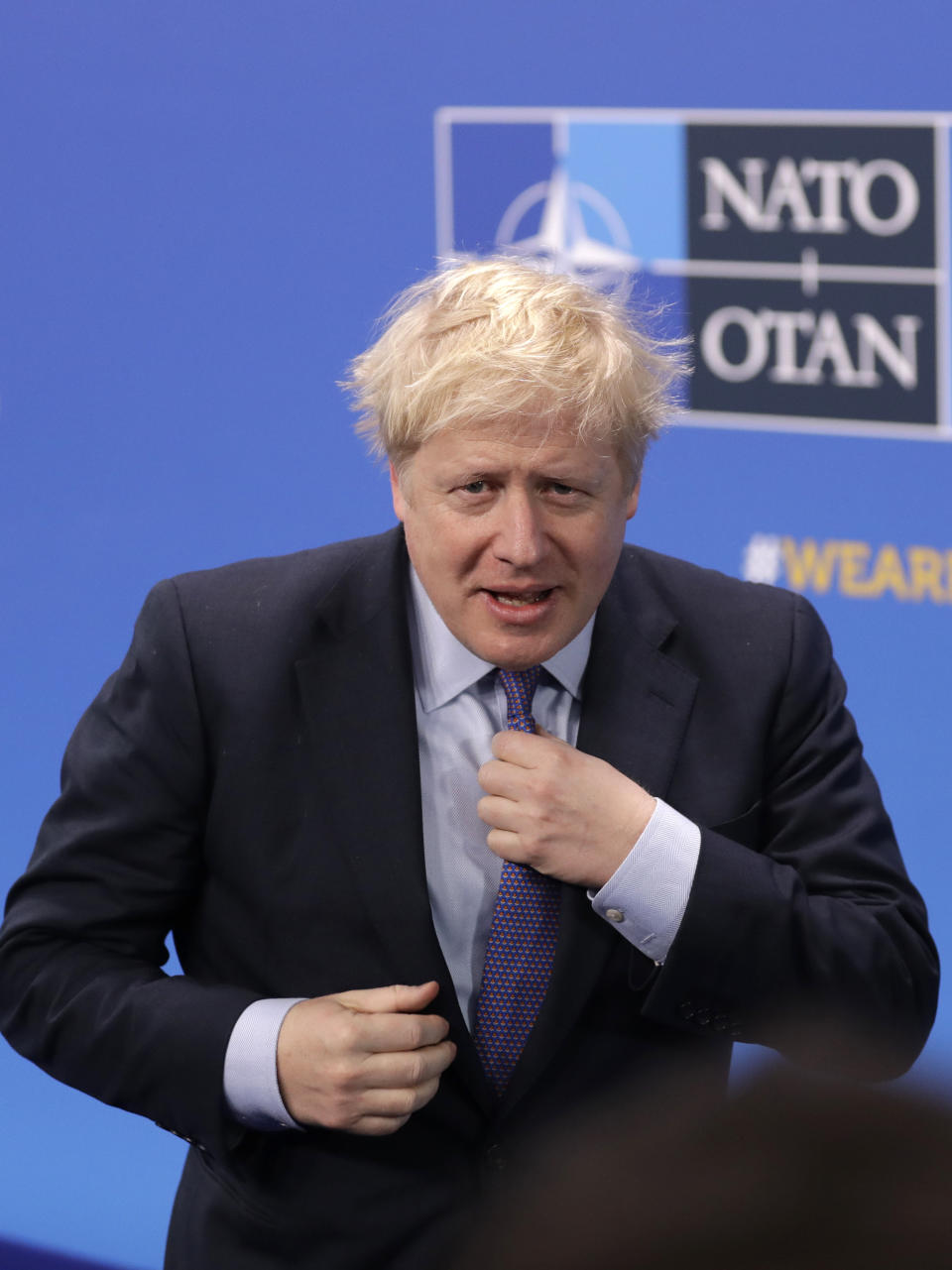 British Prime Minister Boris Johnson arrives for a NATO leaders meeting at The Grove hotel and resort in Watford, Hertfordshire, England, Wednesday, Dec. 4, 2019. As NATO leaders meet and show that the world's biggest security alliance is adapting to modern threats, NATO Secretary-General Jens Stoltenberg is refusing to concede that the future of the 29-member alliance is under a cloud. (AP Photo/Matt Dunham)