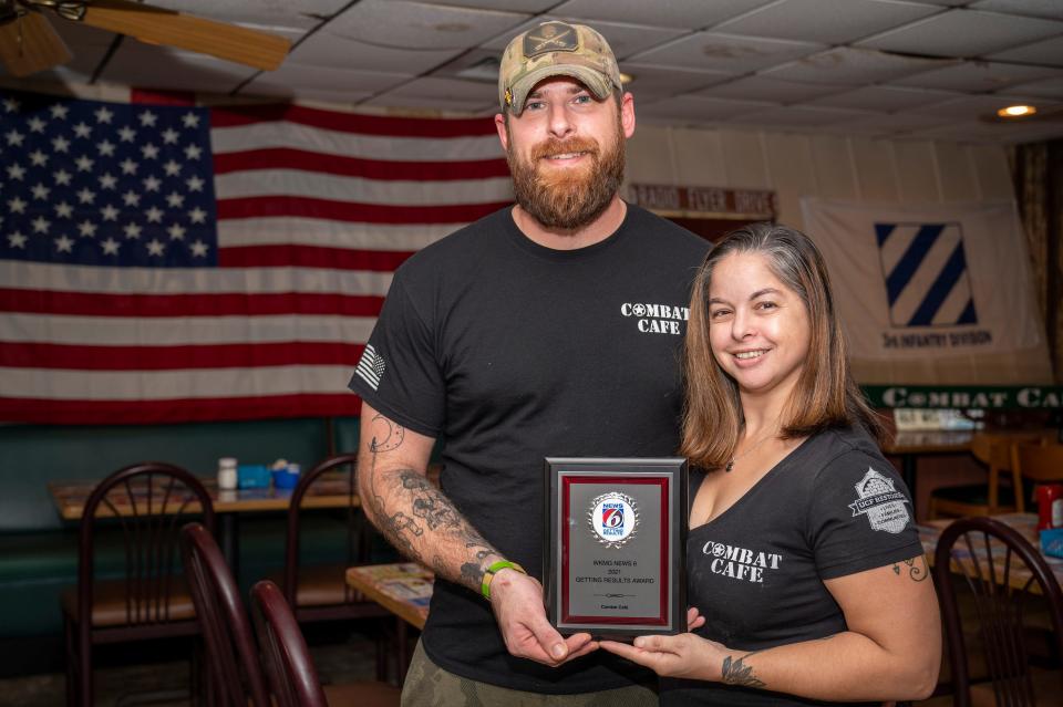 Combat Cafe owners Bruce and Beth Chambers were awarded the “Getting Results” Award by WKMG News 6.