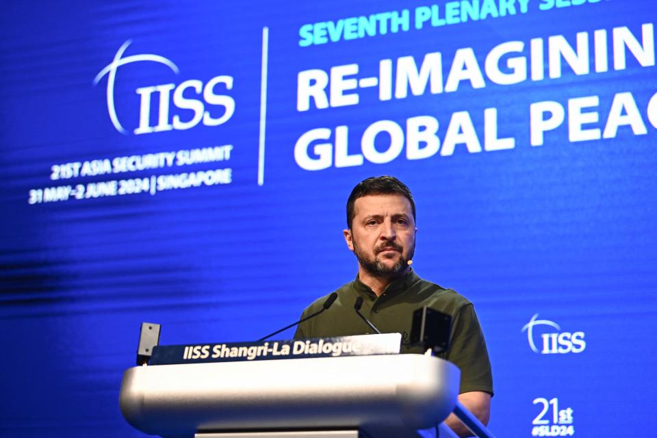 Ukraine’s president Volodymyr Zelensky speaks during the 21st Shangri-La Dialogue summit at the Shangri-La Hotel in Singapore on 2 June 2024 (AFP via Getty Images)