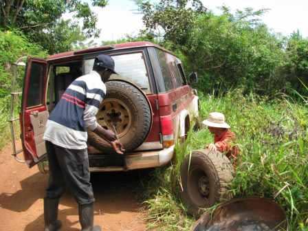 Jack and field assistant Nick repair a flat tire. Photo: Maureen McCarthy.