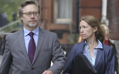John Letts and his wife Sally Lane arrive at Westminster Magistrate's Court in June - Credit: SWNS