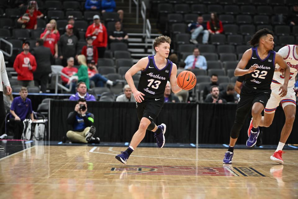 Bowen Born leads Northern Iowa's transition offense during a Missouri Valley Conference Tournament game against Bradley on Friday.