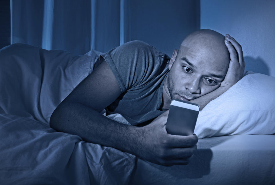 The <a href="http://www.huffingtonpost.com/entry/blue-light-and-sleep-smartphone-melatonin_us_56ba2a27e4b0c3c5504ef07d" target="_blank">blue light </a>streaming out of your phone can seriously damage&nbsp;your sleep. That's because blue light&nbsp;activates the area in the human brain that suppresses melatonin, which helps induce&nbsp;drowsiness.&nbsp;<br /><br />If you want to snooze more soundly and feel more alert during the day, shut&nbsp;off your smartphone and other devices at least an hour before going to bed, <a href="http://www.huffingtonpost.com/2014/03/17/better-sleep-tips-best_n_4958036.html">experts suggest</a>.&nbsp;