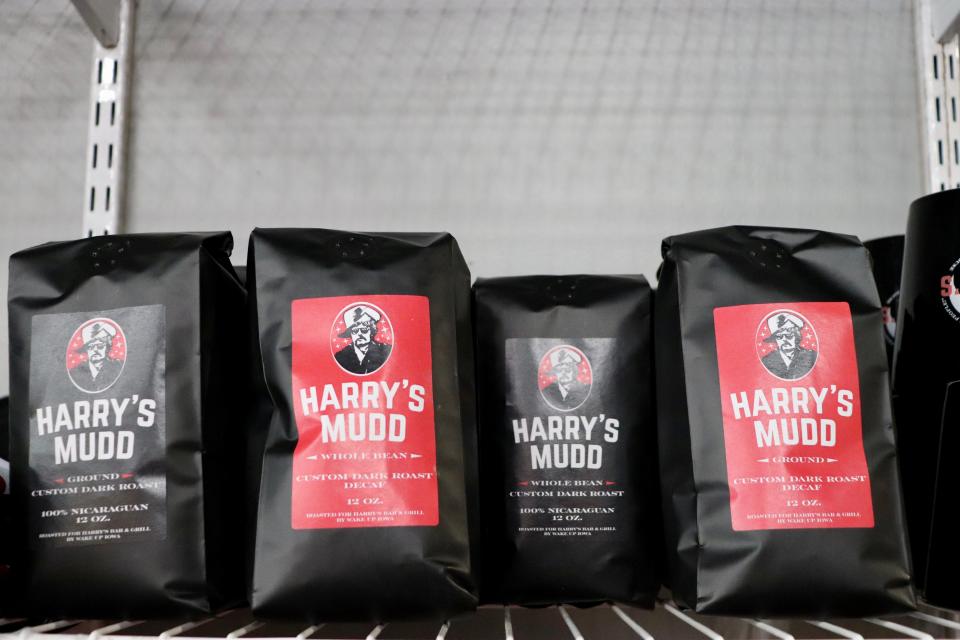 The shelf is stocked with Harry's Mudd at Harry's Bar & Grill on Monday, Aug. 21, 2023. Harry's Mudd is the official coffee blend of downtown Iowa City's newest restaurant.