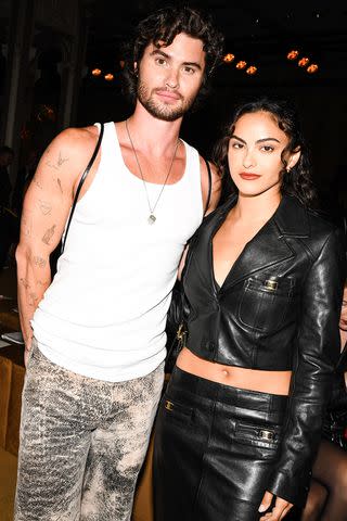 <p>Nina Westervelt/WWD via Getty</p> Chase Stokes and Camila Mendes