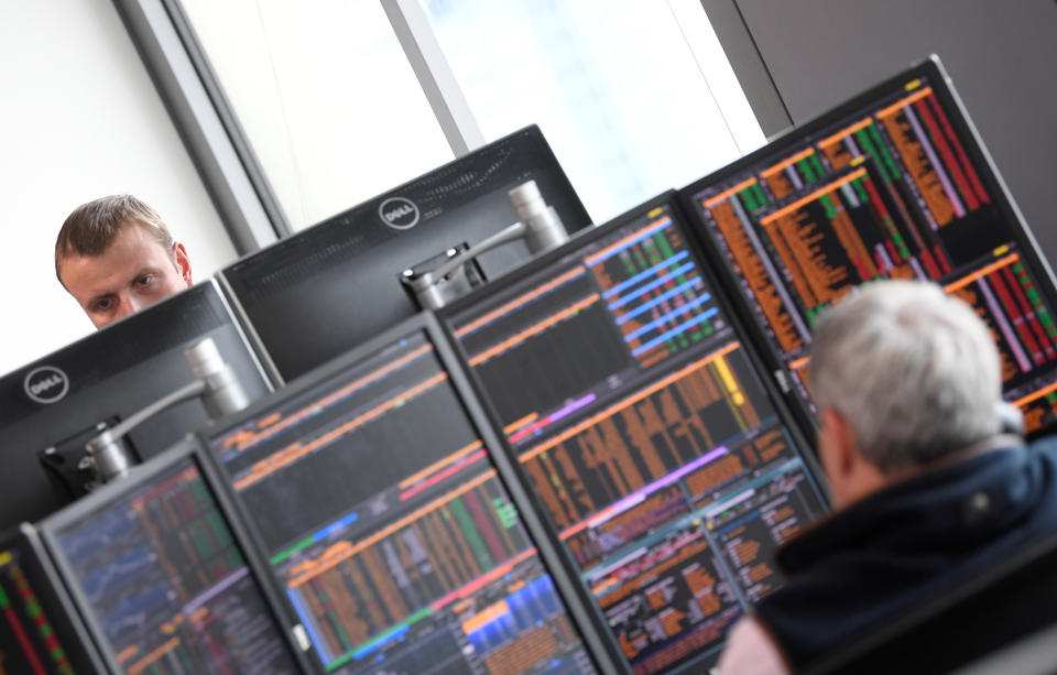 Traders are seen at work at Northern Trust offices in London, Britain August 1, 2019. Picture taken August 1, 2019. REUTERS/Toby Melville