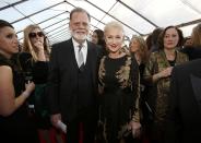 Director Taylor Hackford and his wife, actress Dame Helen Mirren, arrive at the 20th annual Screen Actors Guild Awards in Los Angeles, California January 18, 2014. REUTERS/Mario Anzuoni (UNITED STATES - Tags: ENTERTAINMENT) (SAGAWARDS-ARRIVALS)