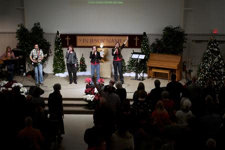 The congregation worships at New Covenant Community Church in Delta, Pennsylvania December 1, 2013. REUTERS/Mark Makela