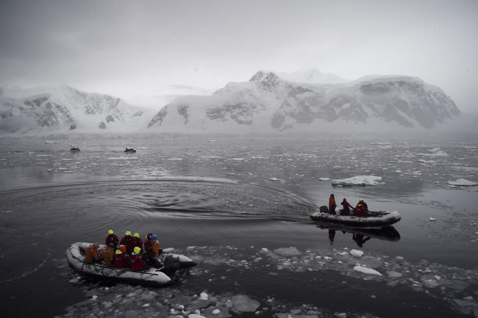 Tourists cruise the western Antarctic peninsula