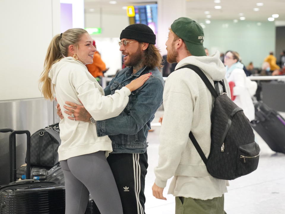 (Left to right) Series winners Sam Thompson, Pete Wicks and Zara McDermott at Heathrow Airport, London, after taking part in ITV's I'm A Celebrity Get Me Out Of Here! in Australia. Date taken: Wednesday December 13, 2023. (Photo by Jonathan Brady/PA Images via Getty Images)