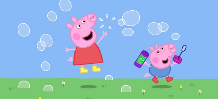 Peppa Pig blowing bubbles with brother George.