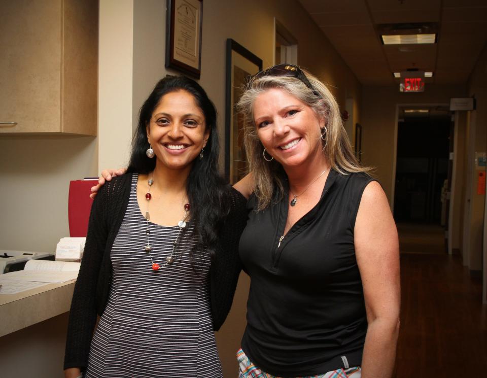 Emily Robinson, right, was treated by Dr. Lakshmi Balasubramanian. u0022I'm at eight years,u0022 Robinson said of her recovery. u0022Every year is better.u0022