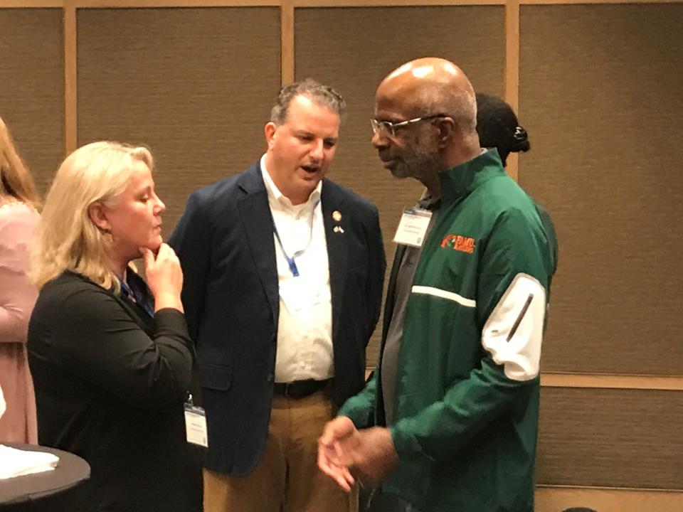 Florida A&M president Larry Robinson and Chief Financial Officer Jimmy Patronis mingle during a meet-and-greet session at the Hilton Tel Aviv after the Florida delegation touched down for a four-day trade mission to Israel in May 2019.