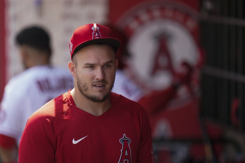 Los Angeles Angels' Mike Trout walks through the detour during a baseball game.