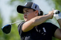 FILE - Ash Barty hits off the sixth tee during the Icons Series USA 2022 golf tournament, Thursday, June 30, 2022, at Liberty National Golf Course in Jersey City, N.J. Shocking everyone except a few close friends and family, the 2022 Australian Open women's singles tennis champion announced her retirement in March. Since, she's married her long-time partner, written a book, improved on her golf game and won two major Australian sports awards to end the year. And she says she has no plans to return to tennis.(AP Photo/John Minchillo, File)