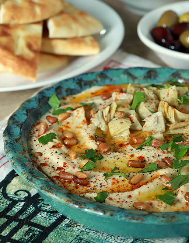 <p>Creative Culinary</p><p>Making your own hummus is easier than you might think.</p><p><strong>Get the recipe: <a href="https://creative-culinary.com/artichoke-roasted-garlic-hummus-recipe/" rel="nofollow noopener" target="_blank" data-ylk="slk:Artichoke and Roasted Garlic Hummus;elm:context_link;itc:0;sec:content-canvas" class="link ">Artichoke and Roasted Garlic Hummus</a></strong></p>