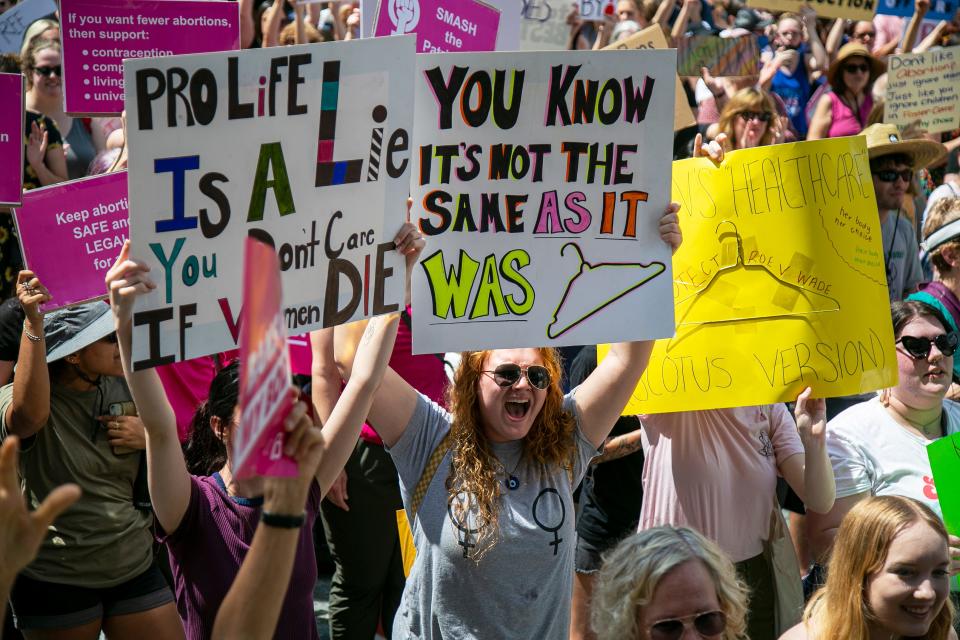 Demonstrators pack Fountain Square in downtown Cincinnati during the “Bans Off Our Bodies" rally Saturday, May 14, 2022. More than 380 "Bans Off Our Bodies" protests for abortion rights were planned across the United States. The protests follows the leak of a draft opinion indicating the Supreme Court could overturn the landmark Roe v. Wade decision that established a constitutional right to abortion. 