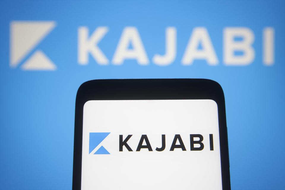 UKRAINE - 2021/05/05: In this Photo illustration a Kajabi logo of a software company is seen on a smartphone and a pc screen. (Photo Illustration by Pavlo Gonchar/SOPA Images/LightRocket via Getty Images)