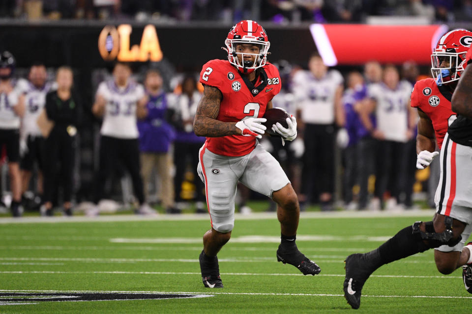 INGLEWOOD, CA - JANUARY 09: Georgia Bulldogs running back Kendall Milton (2) runs the ball during the Georgia Bulldogs game versus the TCU Horned Frogs in the College Football Playoff National Championship game on January 9, 2023, at SoFi Stadium in Inglewood, CA. (Photo by Brian Rothmuller/Icon Sportswire via Getty Images)