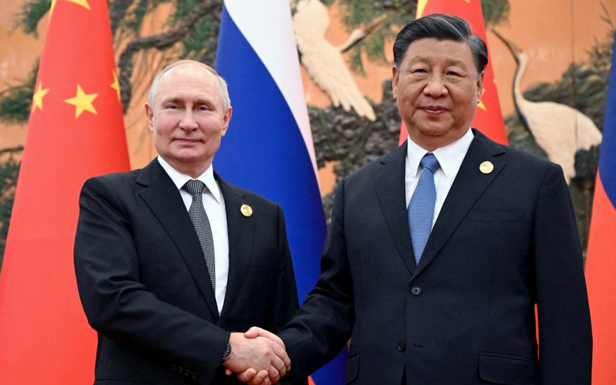 Vladimir Putin and Xi Jinping meet in Beijing in October 2023