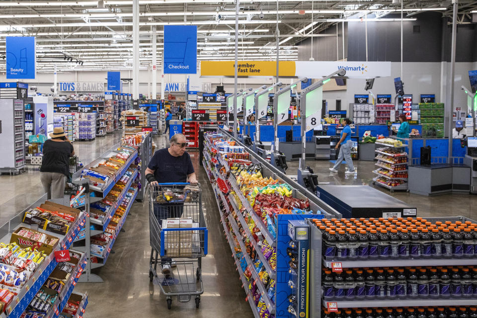 People buy stuff at a Walmart Superstore in Secaucus, New Jersey, Thursday, July 11, 2024. (AP Photo/Eduardo Munoz Alvarez)