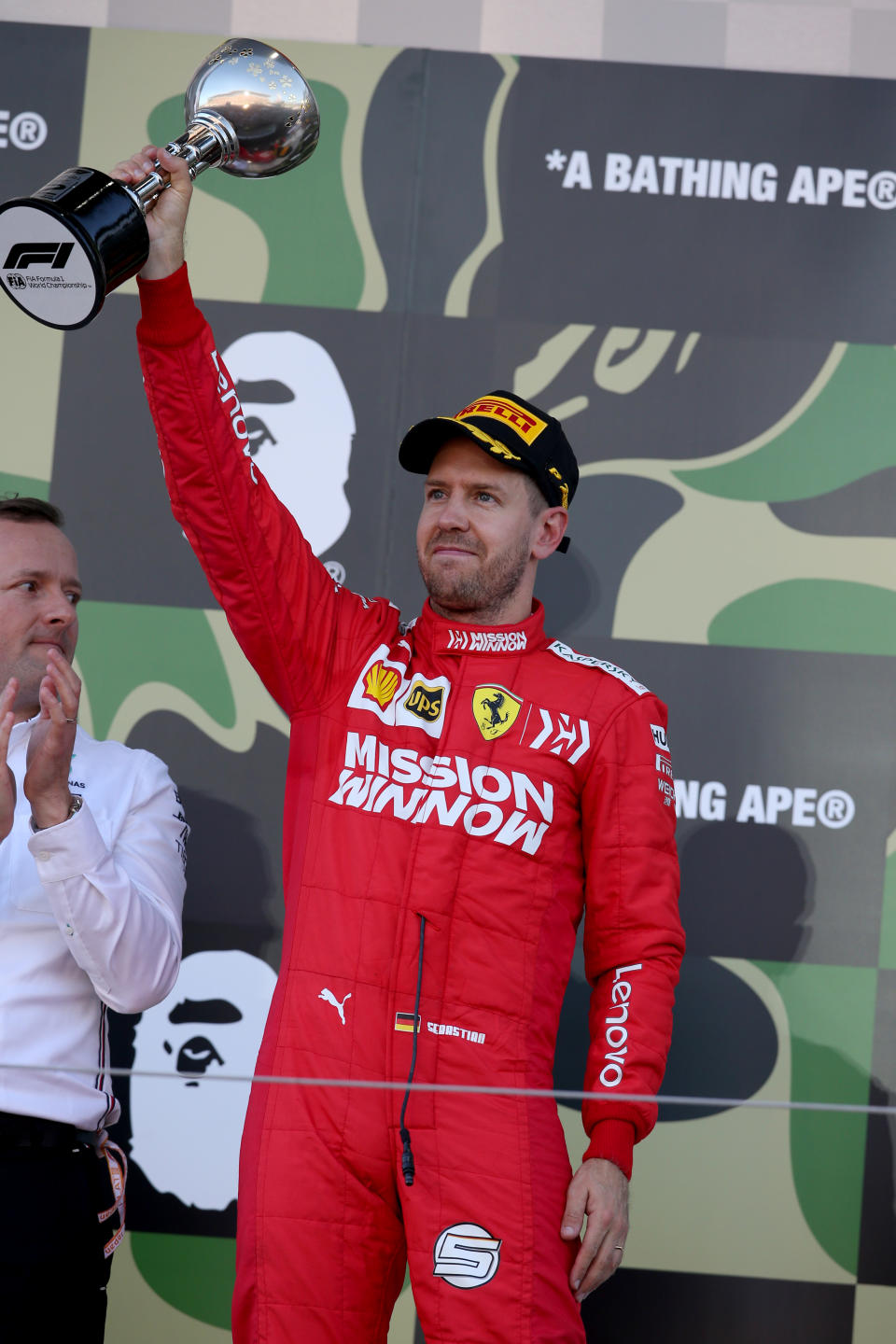 SUZUKA, JAPAN - OCTOBER 13: Second placed Sebastian Vettel of Germany and Ferrari celebrates on the podium during the F1 Grand Prix of Japan at Suzuka Circuit on October 13, 2019 in Suzuka, Japan. (Photo by Charles Coates/Getty Images)