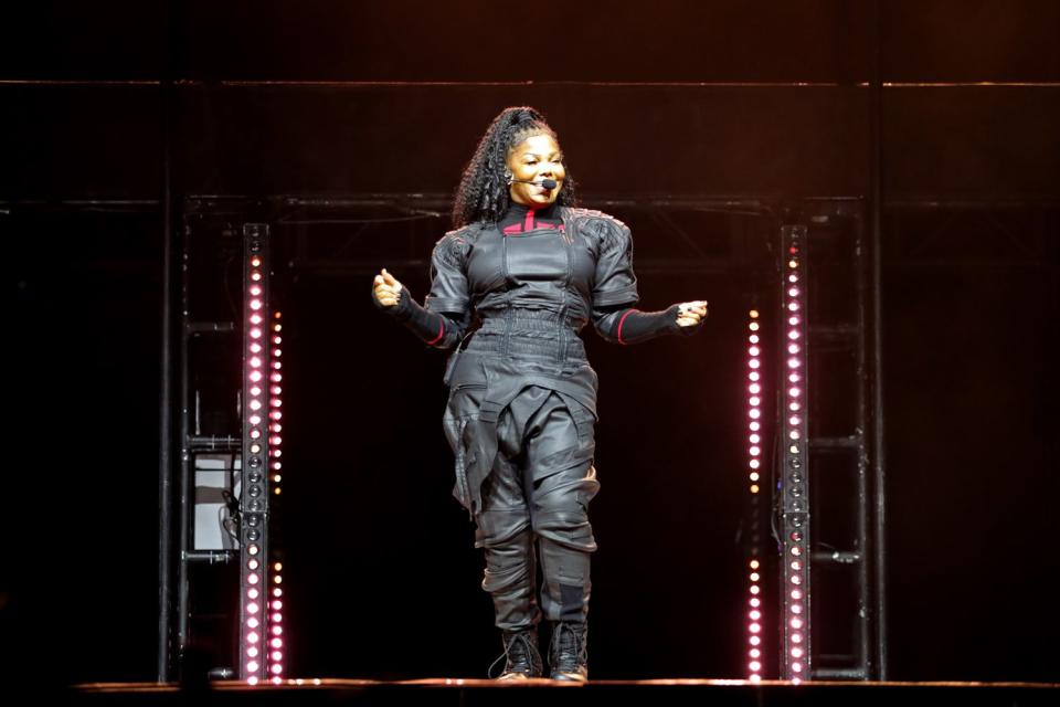 <p>Bob Levey/Getty</p> Janet Jackson performs in Houston in December 2023