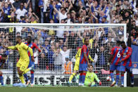 Crystal Palace players react after Chelsea's Ruben Loftus-Cheek, foreground left, scored the opening goal during the English FA Cup semifinal soccer match between Chelsea and Crystal Palace at Wembley stadium in London, Sunday, April 17, 2022. (AP Photo/Ian Walton)