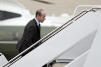 FILE - In this Nov. 2, 2018, file photo, President Donald Trump's White House Senior Adviser Stephen Miller boards Air Force One for campaign rallies in West Virginia and Indiana, in Andrews Air Force Base, Md. The White House is digging in on its demand for $5 billion to build a border wall as congressional Democrats stand firm against it, pushing the federal government closer to the brink of a partial shutdown. Miller says Trump is prepared to do “whatever is necessary” to build a wall along the U.S.-Mexico border. (AP Photo/Evan Vucci, File)