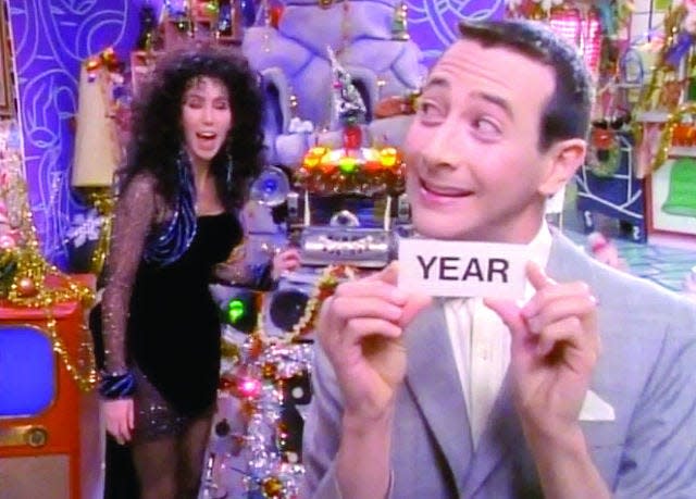 Pee-wee Herman (Paul Reubens) and Cher star in the 1988 TV show "Pee-wee's Playhouse Christmas Special."