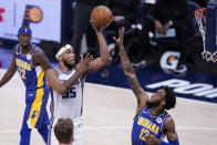 Sacramento Kings' Marvin Bagley III (35) shoots over Indiana Pacers' Oshae Brissett (12) during the first half of an NBA basketball game Wednesday, May 5, 2021, in Indianapolis. (AP Photo/Darron Cummings)