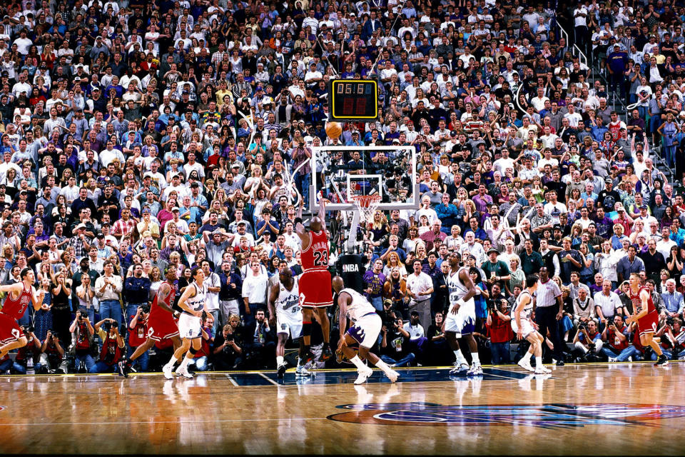 Michael Jordan sinks this shot with six seconds left that gave the Chicago Bulls an 87-86 win over the Utah Jazz in Game 6 of the 1998 NBA Finals. (Getty Images)