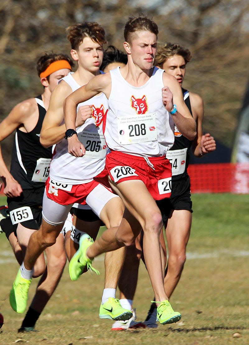 Marion senior Jedidiah Osgood (208) starts his race at the State Cross Country Class 3A Boys 5K race at the Lakeside Municipal Golf Course in Fort Dodge.