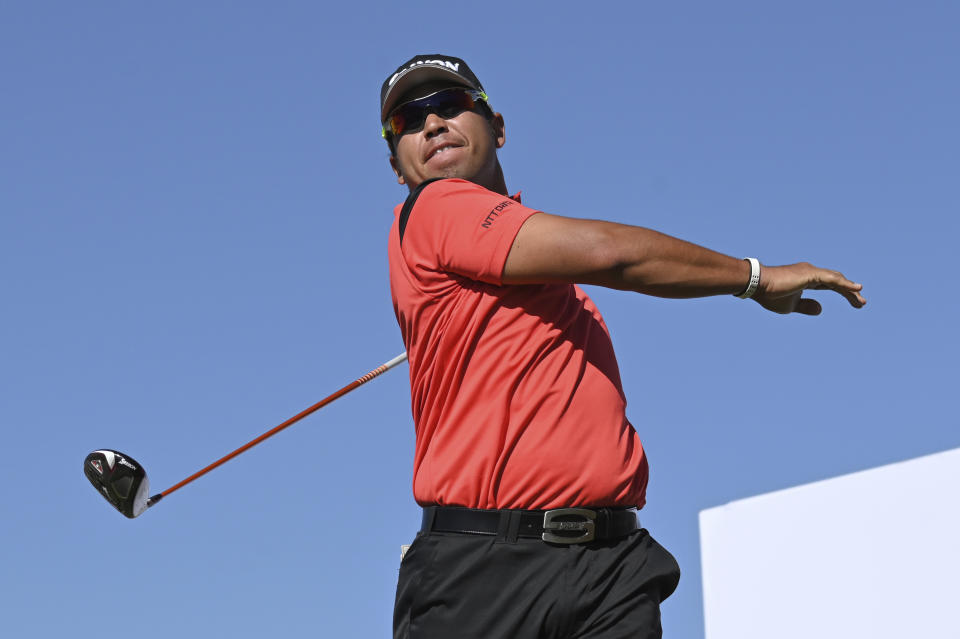 Hideki Matsuyama, of Japan, watches his tee shot on the 18th hole during first round of the CJ Cup golf tournament Thursday, Oct. 14, 2021, in Las Vegas. (AP Photo/David Becker)